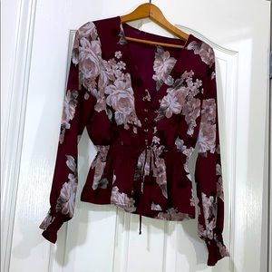 Floral long sleeve tie front peplum blouse